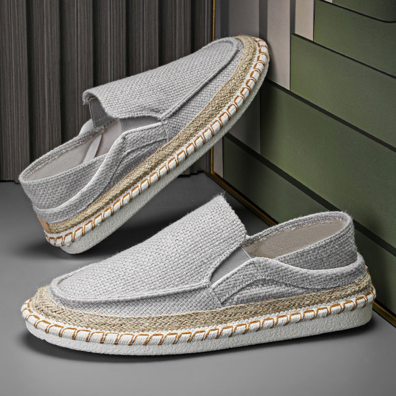 Stylish grey Old Beijing style slip-on shoes featuring a woven texture and comfortable design