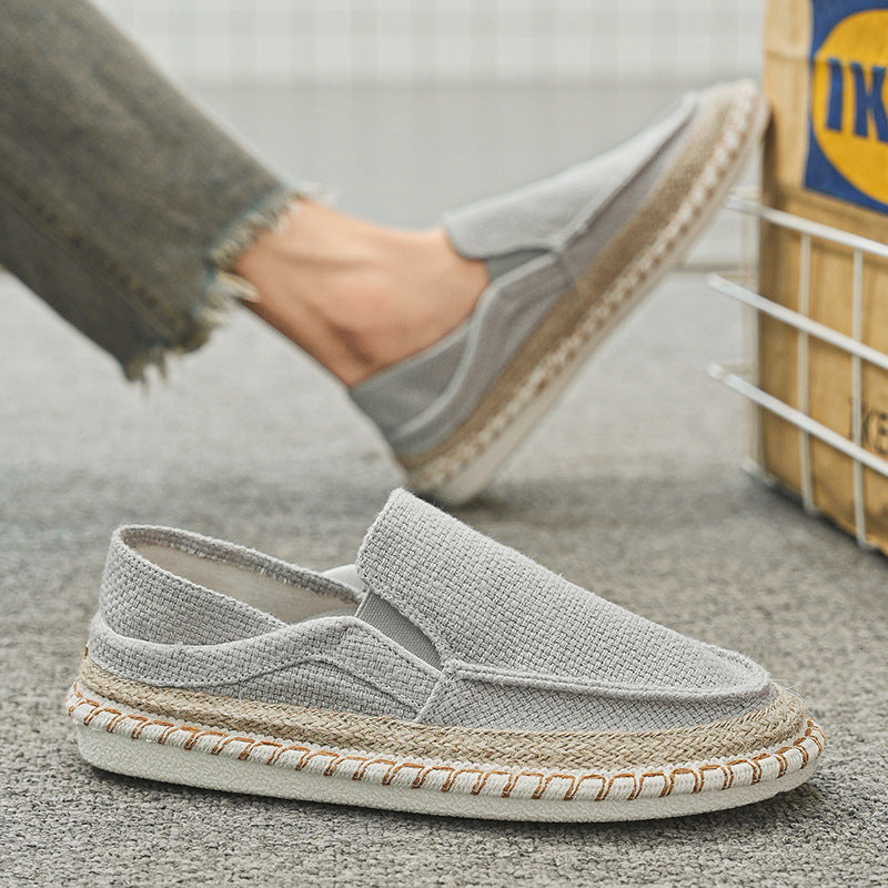 Stylish Old Beijing style slip-on shoes in grey with a natural woven sole for casual wear