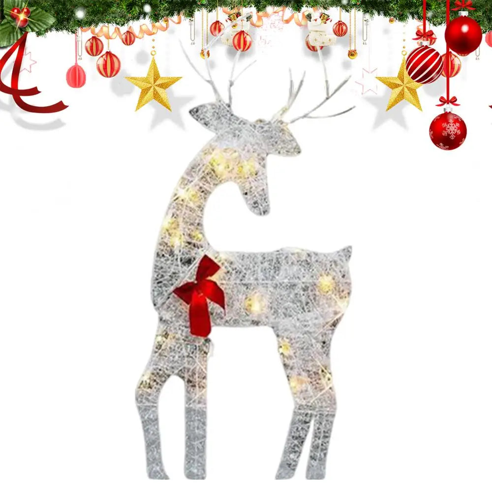 Outdoor glowing elk Christmas ornament in iron with decorative lights and a red bow