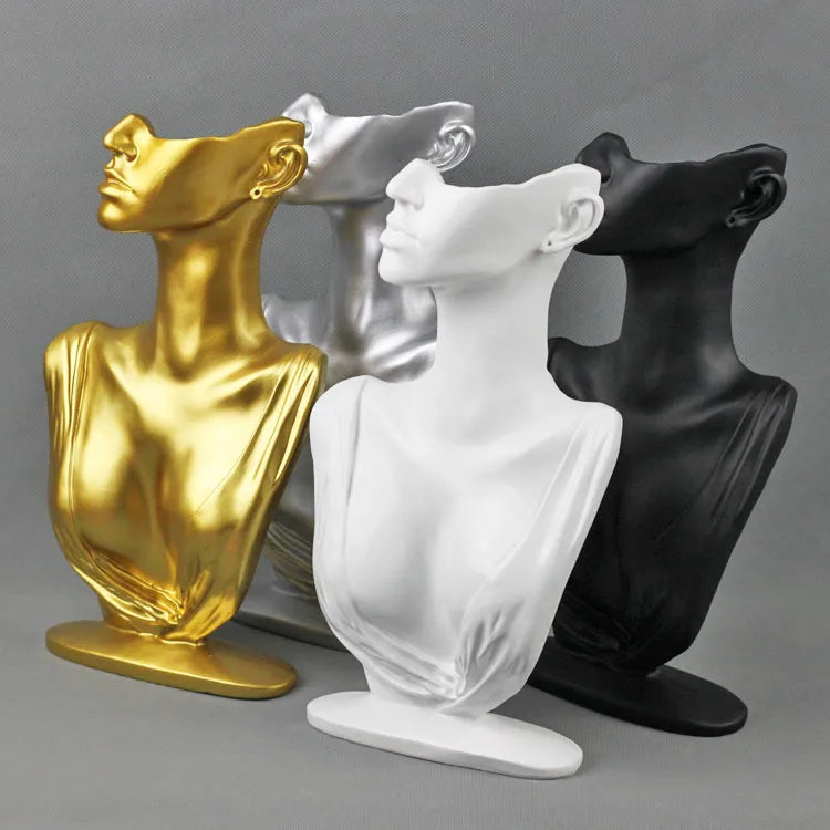 Elegant resin jewellery display stand in gold, silver, black, and white for showcasing accessories
