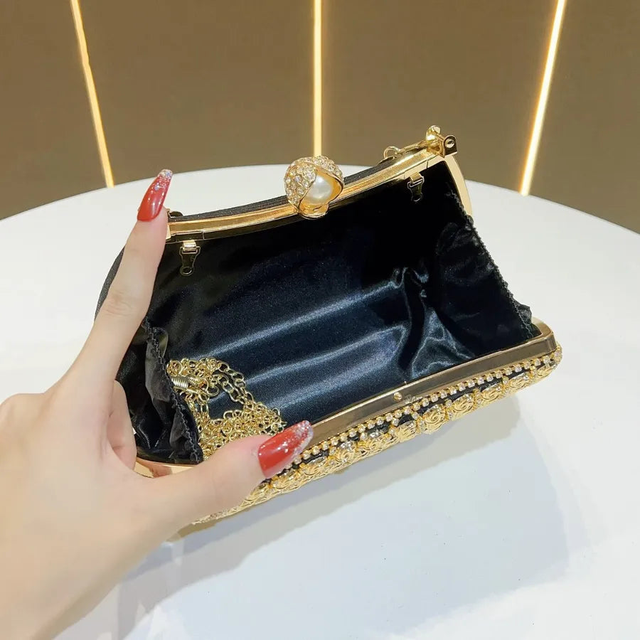 Retro Chinese style evening bag in black with gold embellishments and chain strap for elegant occasions