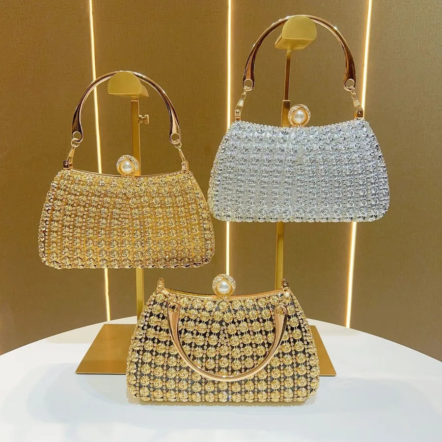 Three stylish retro Chinese style evening bags in gold and silver with elegant embellishments