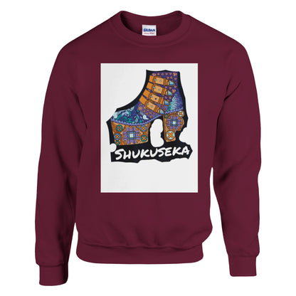 Maroon classic heavy blend sweatshirt featuring a stylish Shukuseka graphic design