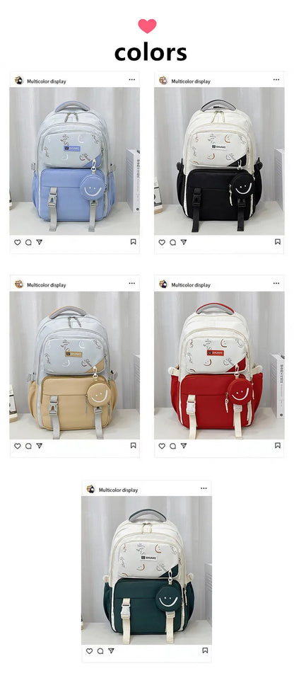 Luxurymania24 in five colours primary school backpack for girls with front pockets adjustable straps and key charm