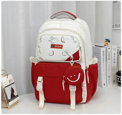 White and red smiley design primary school backpack for girls with front pocket side pockets and round coin pouch