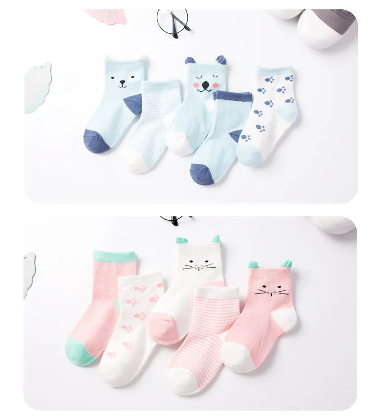 Set of soft toddler socks for boys and girls featuring cute animal designs in blue and pink