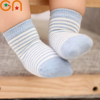 Soft toddler socks for boys and girls in blue and white stripes, perfect for everyday wear.