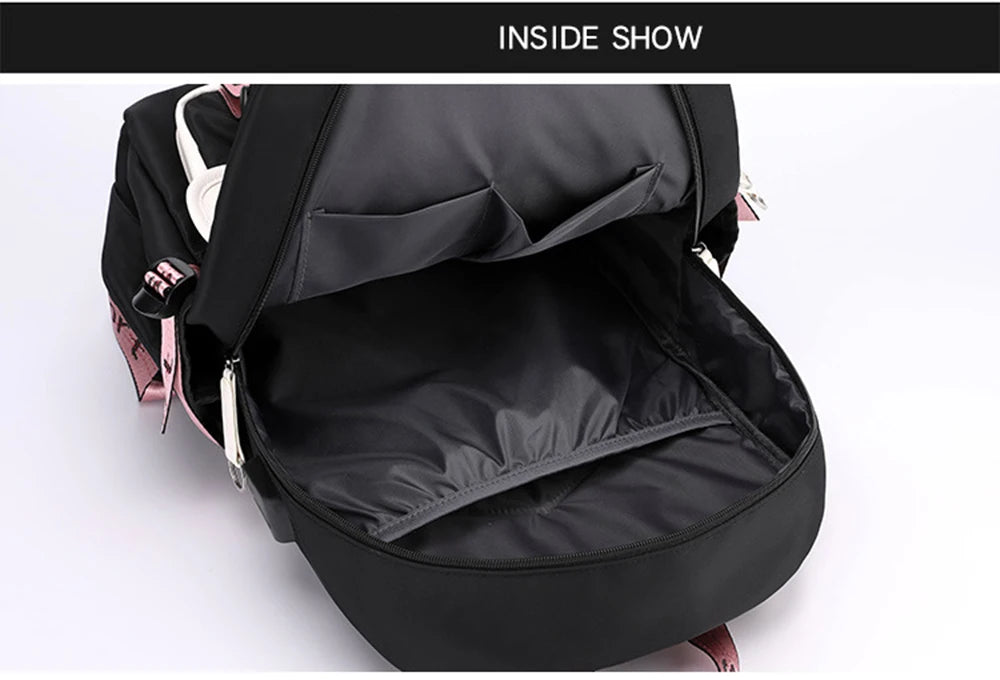 Pink Black Laptop Backpack For Students with open main compartment showing padded laptop sleeve and organiser pockets