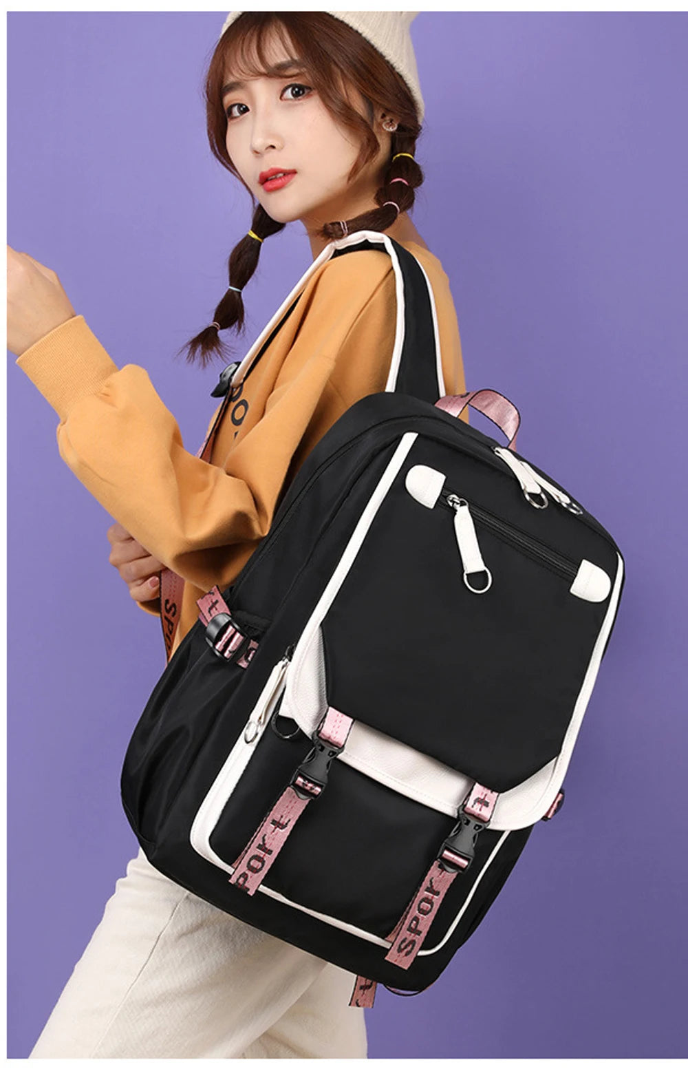 Pink Black Laptop Backpack For Students worn by student model, black bag with pink straps and white trim, laptop compartment