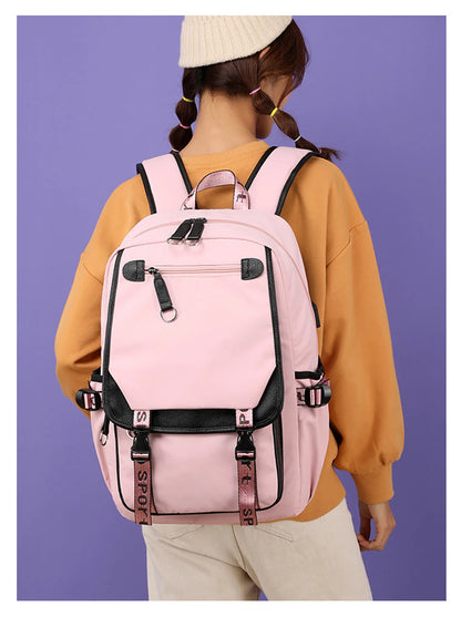 Pink Black Laptop Backpack For Students worn by student model with roomy compartments padded straps and side pockets