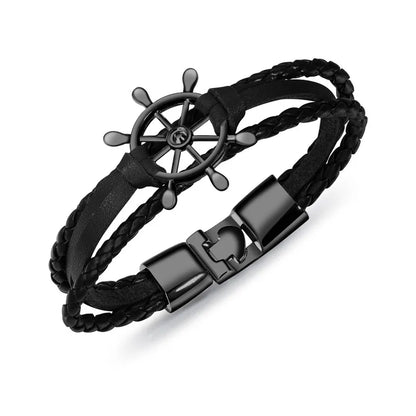 Vintage braided leather charm bracelet with a nautical steering wheel design and secure clasp