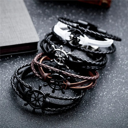 Vintage braided leather charm bracelet featuring nautical themes in various colours for stylish accessory lovers