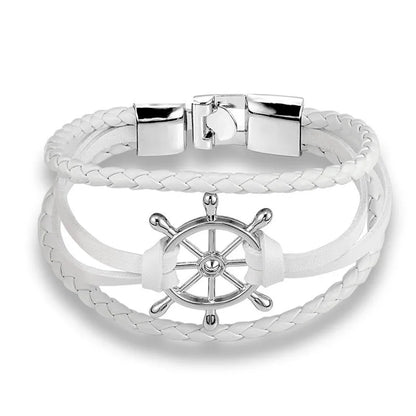 Stylish vintage braided leather charm bracelet featuring a ship's wheel design in white