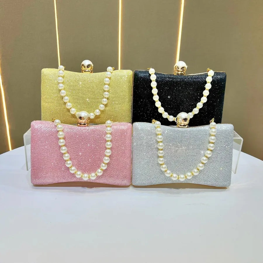 Stylish wedding beaded sequin handbag collection in pink, yellow, black, and silver with pearl straps