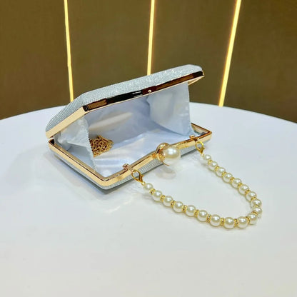 Elegant wedding beaded sequin handbag with pearl chain and gold accents for special occasions
