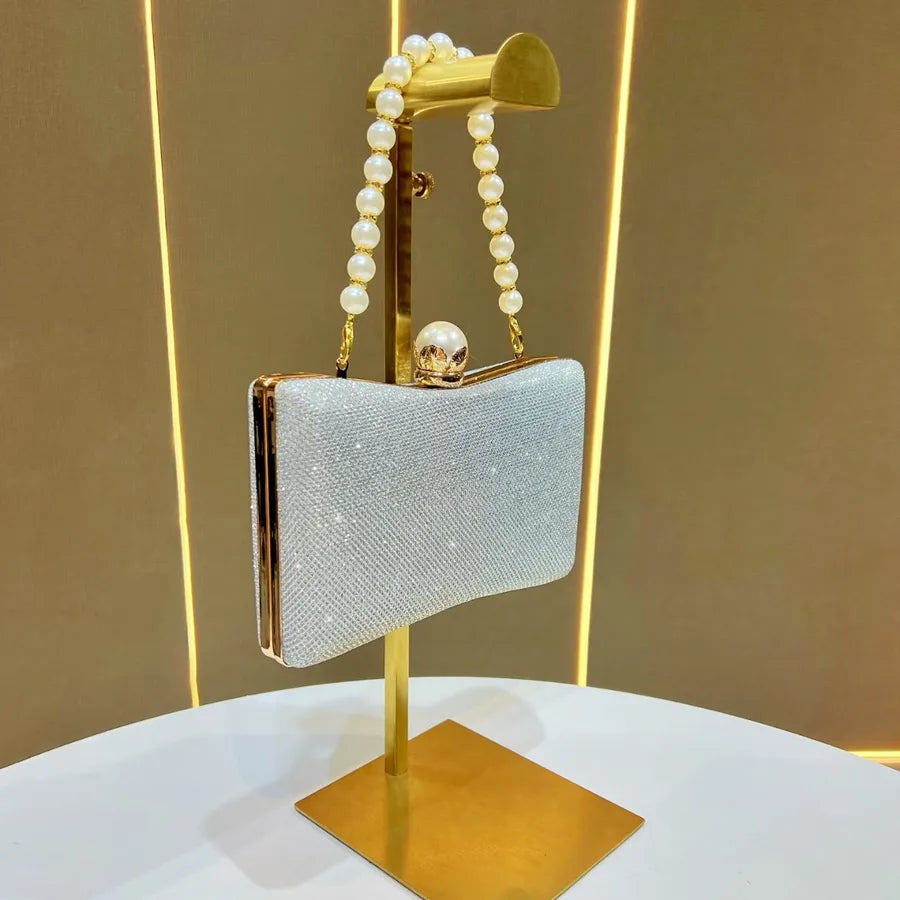 Elegant wedding beaded sequin handbag with a pearl strap and gold clasp detail