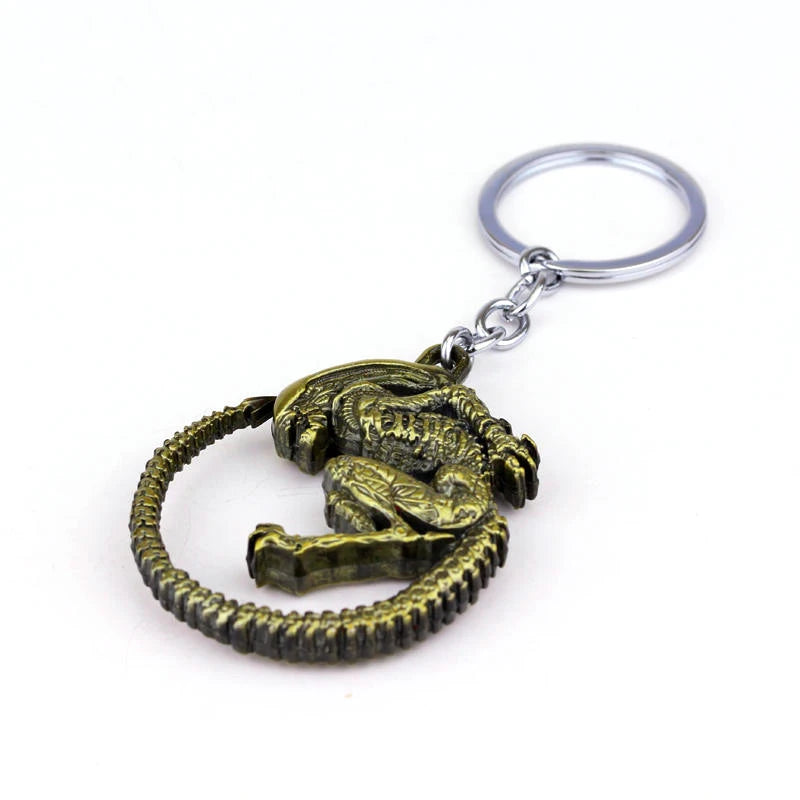 Xenomorph Queen key ring in antique bronze finish detailed with intricate designs