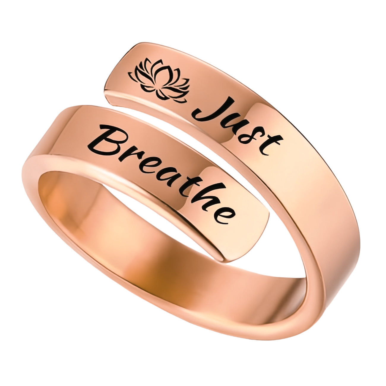 Rose gold adjustable wrap ring with lotus motif and just breathe engraved ring in black script